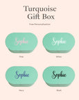 Turquoise gift box with personalised name in Pink, White, Navy and Black