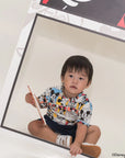 baby wearing pop comic mickey tee