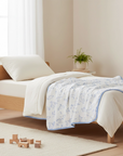 Bamboo Muslin Blanket - Beary Best on a bed