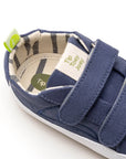 Inside of a Bossy Green Sneaker in Lona Azul Klein showing the soft lining and insole