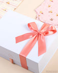 Luxury personalised baby gift box with ribbon packaging