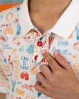 Close-up of the collar and fabric detail on the Elly Childhood Games Polo.