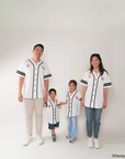 Family of four wearing matching baseball tee - pop mickey