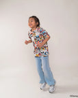 Child wearing pop comic mickey on a white background