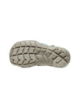 Detailed view of the tan non-marking rubber sole on the Bright Aqua sandal, featuring a multi-directional grip pattern for wet surfaces.