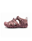 Right-side profile of the mauve sandal highlighting the thick, contoured midsole and open-vented design for breathability.