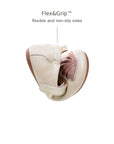 Tip Toey Joey Seashell Mary Janes in White Dream / Rose Gold / Metal Blue bending at the toe to show the flexible sole