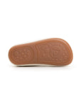 Bottom view of the brown rubber Flex&Grip sole featuring a textured pattern for traction and foot health.