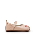 Side view of a blush pink leather baby Mary Jane shoe showing the low profile and flat sole design.