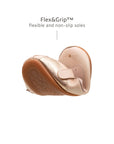 Demonstrating the flexible FlexiGrip sole on the candy dream baby kitten shoe, designed for natural foot movement in toddlers.