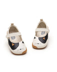 Front view of the baby kitten-themed Mary Janes showing the multi-color cat face design and comfortable wide toe box.
