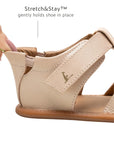 Close-up of the Stretch & Stay elastic heel on the pink leather baby sandal for a secure, easy-on fit.