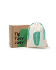 Candy dream pink baby sandals shown with the Tip Toey Joey gift box and signature cotton drawstring storage bag.