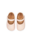 Overhead view of pink baby Roundy shoes showing the wide toe box and ergonomic design for healthy feet.