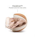Demonstrating the flexible FlexiGrip rubber sole on the candy dream pink leather baby winter boot.