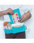 Makeup Set (Pulling out eye shadow from waist band)