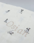 Beige Dalmatian puppy blanket with personalized name Osian