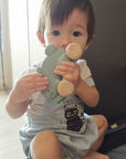 Plan Toys - Push Along Bunny Blue (Holding it)