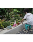 Plan Toys - Push Along Bunny Pink (Playing Front)