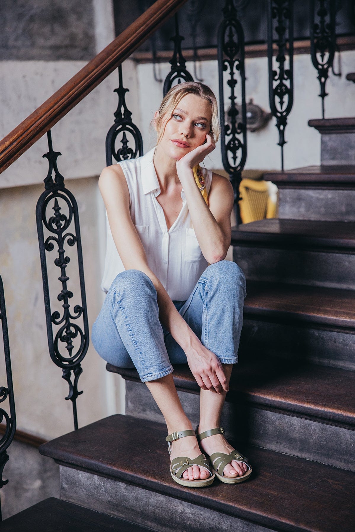 Ksenia at Olive Boardwalk cafe, sitting on stairs