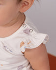 Baby wearing white floral top (DSC03758)