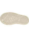Teal blue rubber outsole with textured grip pattern and anti-slip traction design