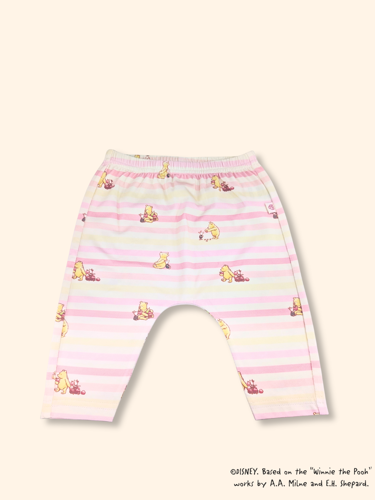 Baby leggings with pink stripes and Pooh print, soft bamboo cotton fabric