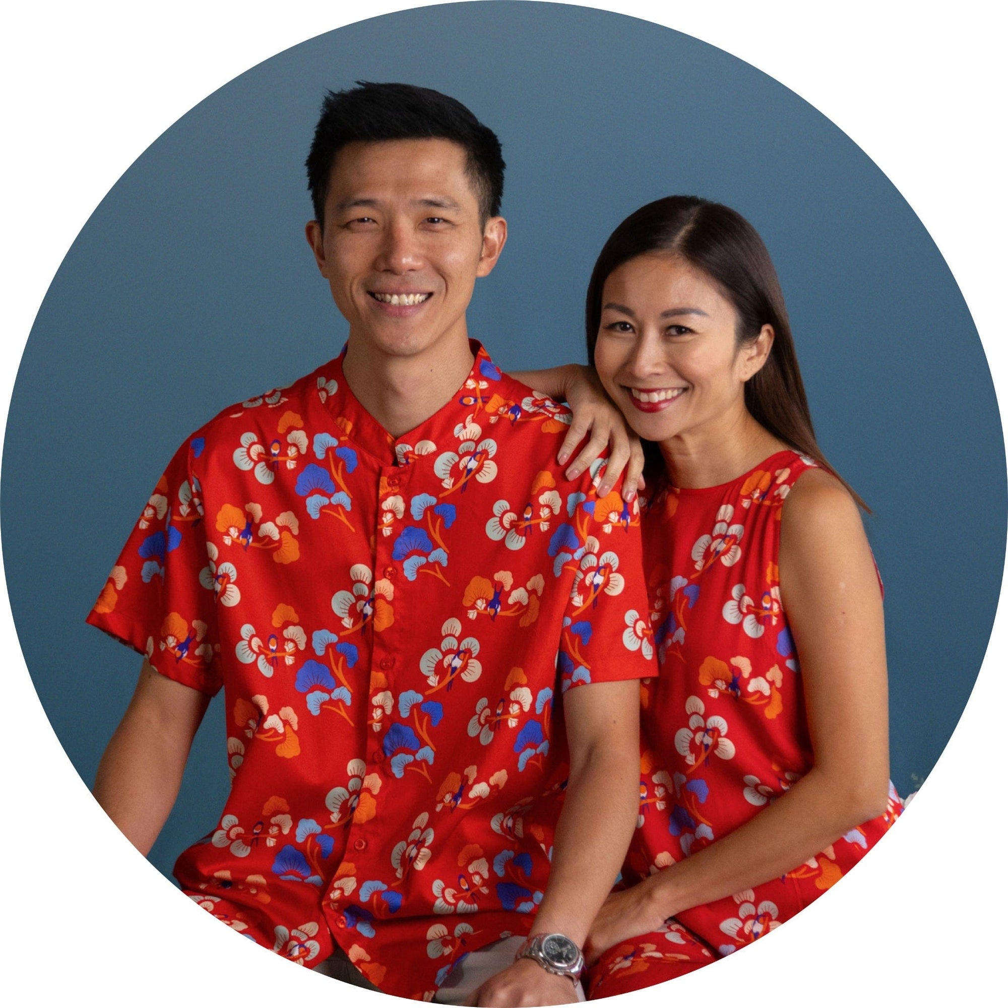 Couple in matching red floral shirts