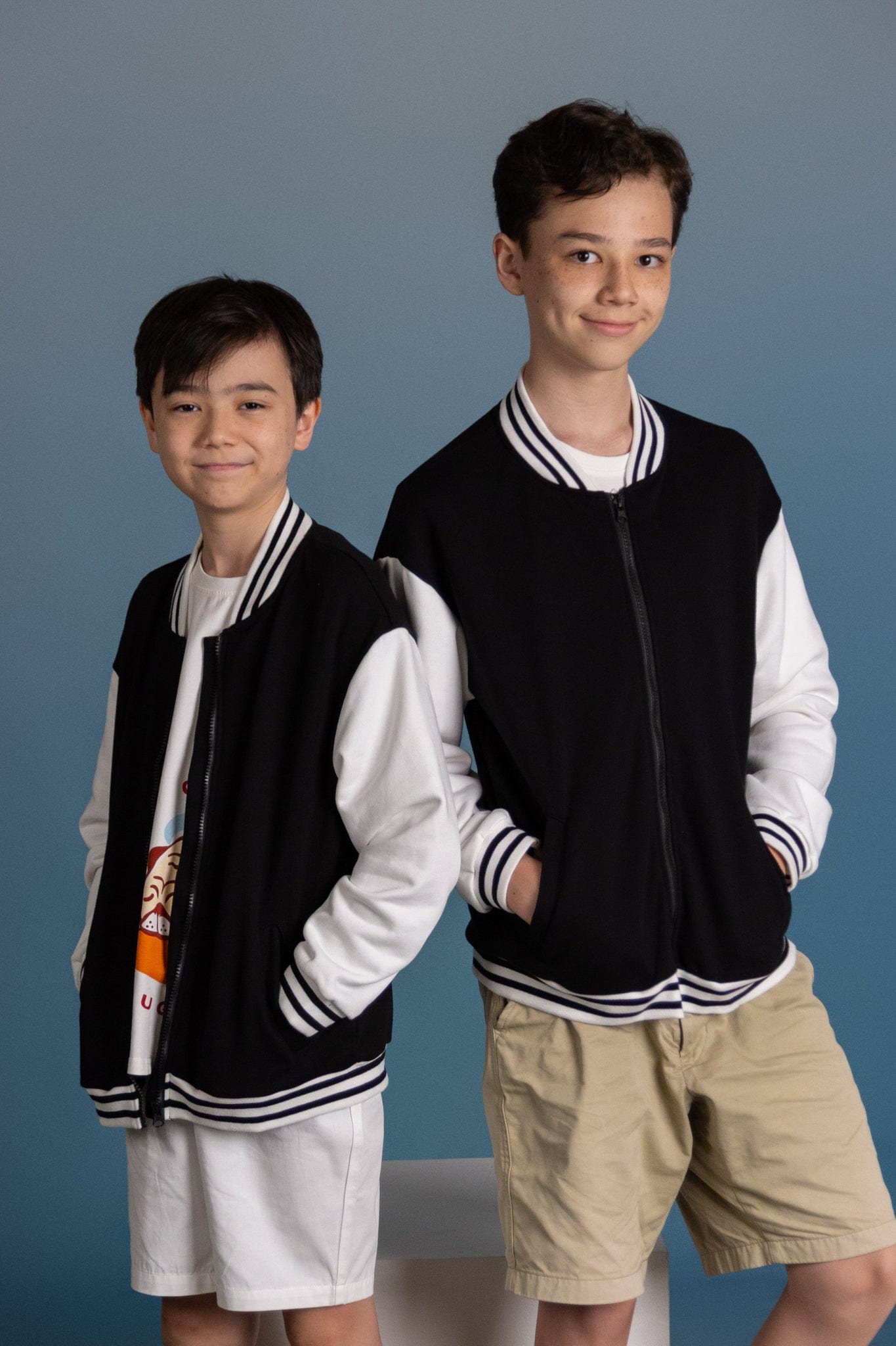 Boys in black and white varsity jackets, R6I_1576