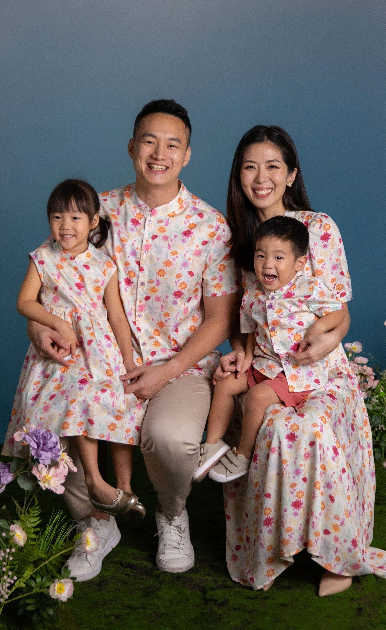 Family portrait in matching floral outfits