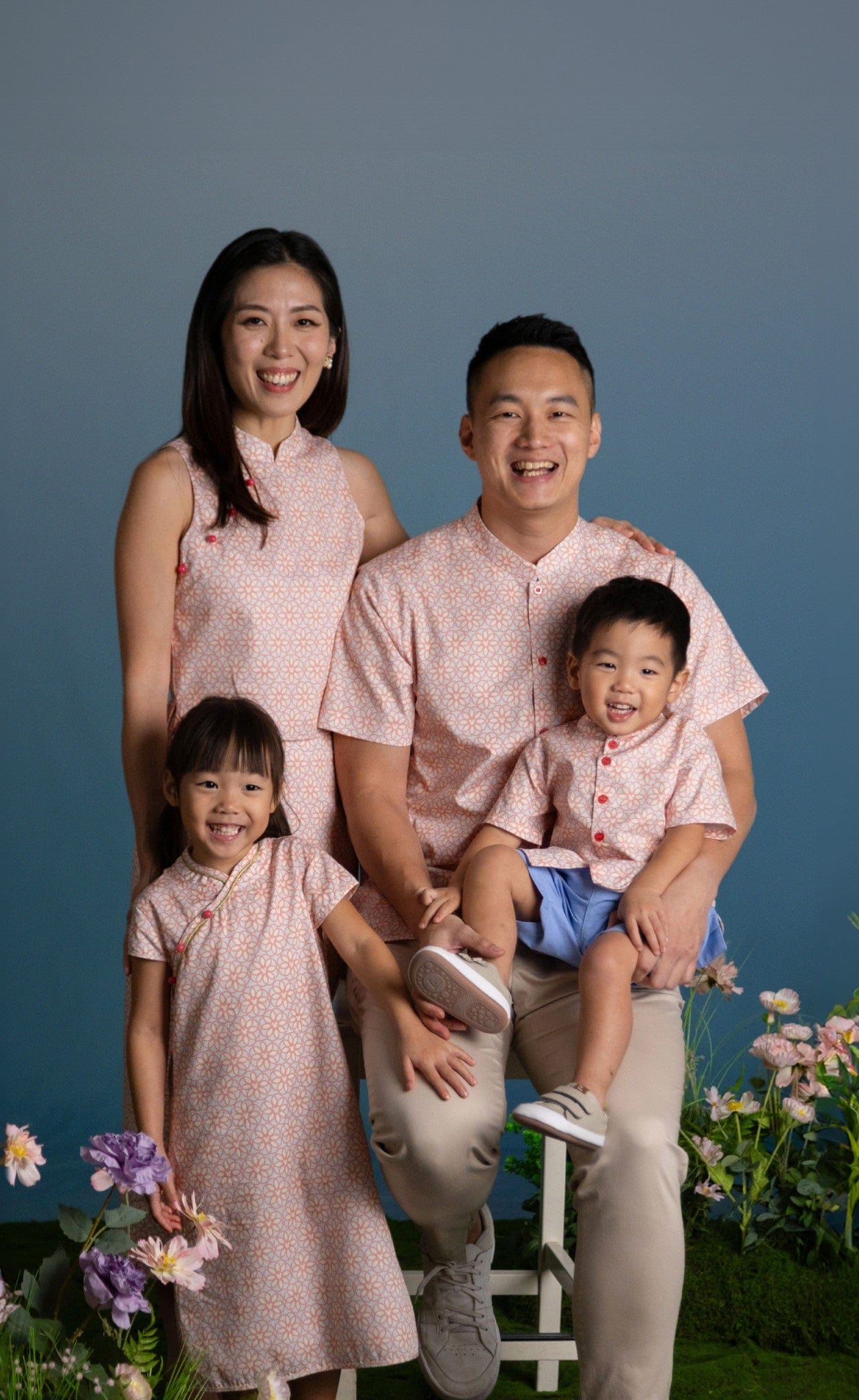 Family portrait in pink outfits