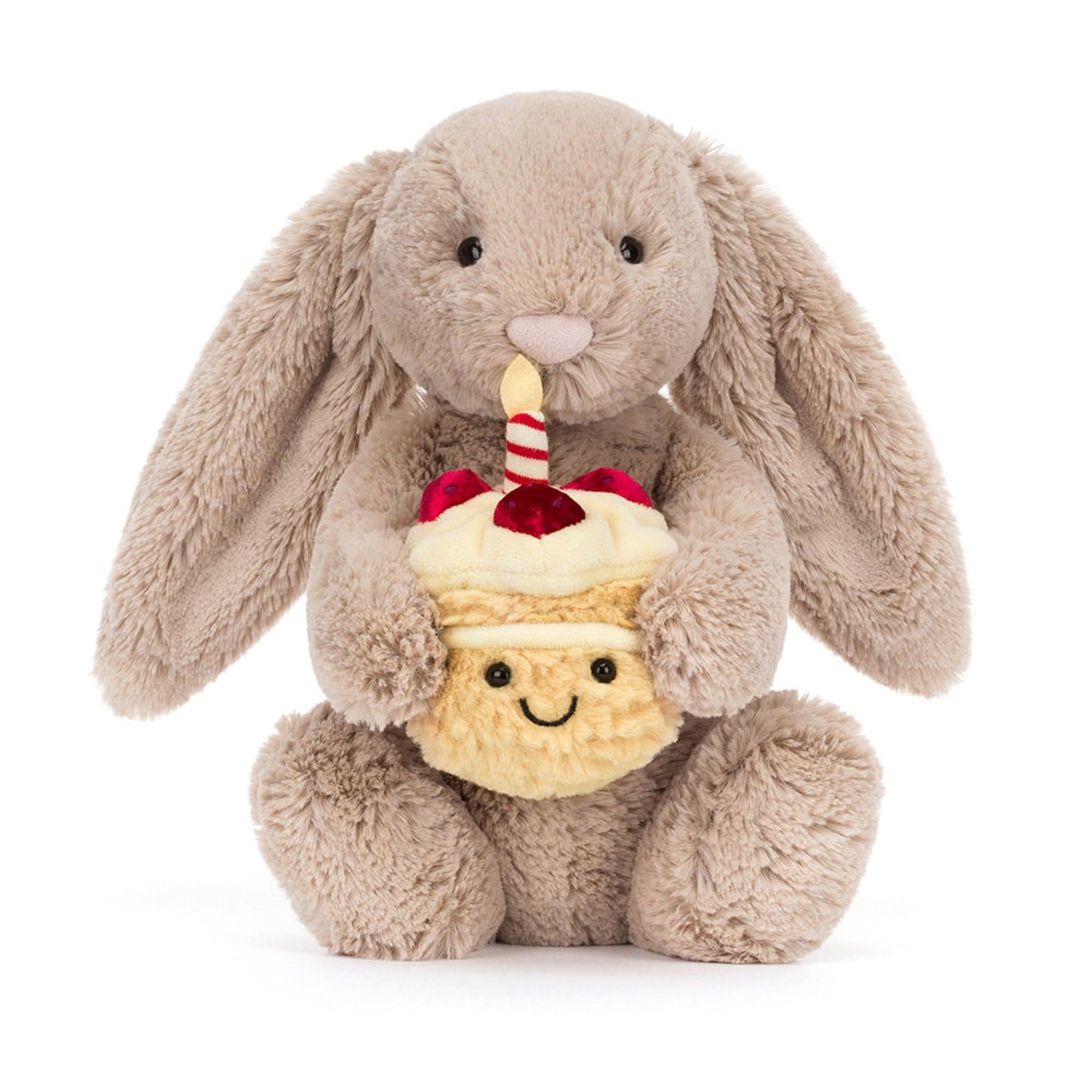 Beige bunny plush toy holding birthday cupcake