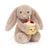 Beige bunny holding birthday cupcake