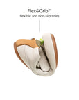 Tip Toey Joey Bossy Brave Sneakers in Tapioca and Olive Tree being bent to show the flexible sole
