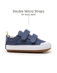 Side view of Bossy Green Sneakers in Lona Azul Klein with double velcro straps for chubby feet