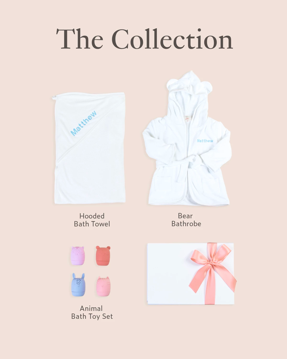 Flatlay of personalised baby gift set with towel, animal toys, gift box, and ribbon packaging
