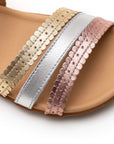 Side view of Tip Toey Joey Coil Sandals in Metal Gold / Sterling Silver / Rose Gold