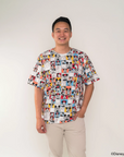 Man wearing adult tee in pop comic mickey design with a plain background