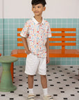 Elly Childhood Games Polo Tee and white shorts full outfit set.