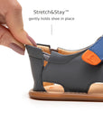 Back view of Tip Toey Joey Explore Sandals in Slate Blue / Caja / Blue Tang showing the Stretch&Stay elastic heel