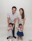 Family of four wearing matching  Nautical Mickey design 