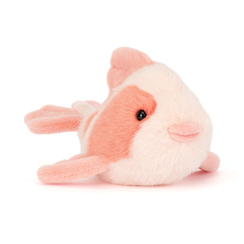 Plush toy fish with pink and white colors on a white background