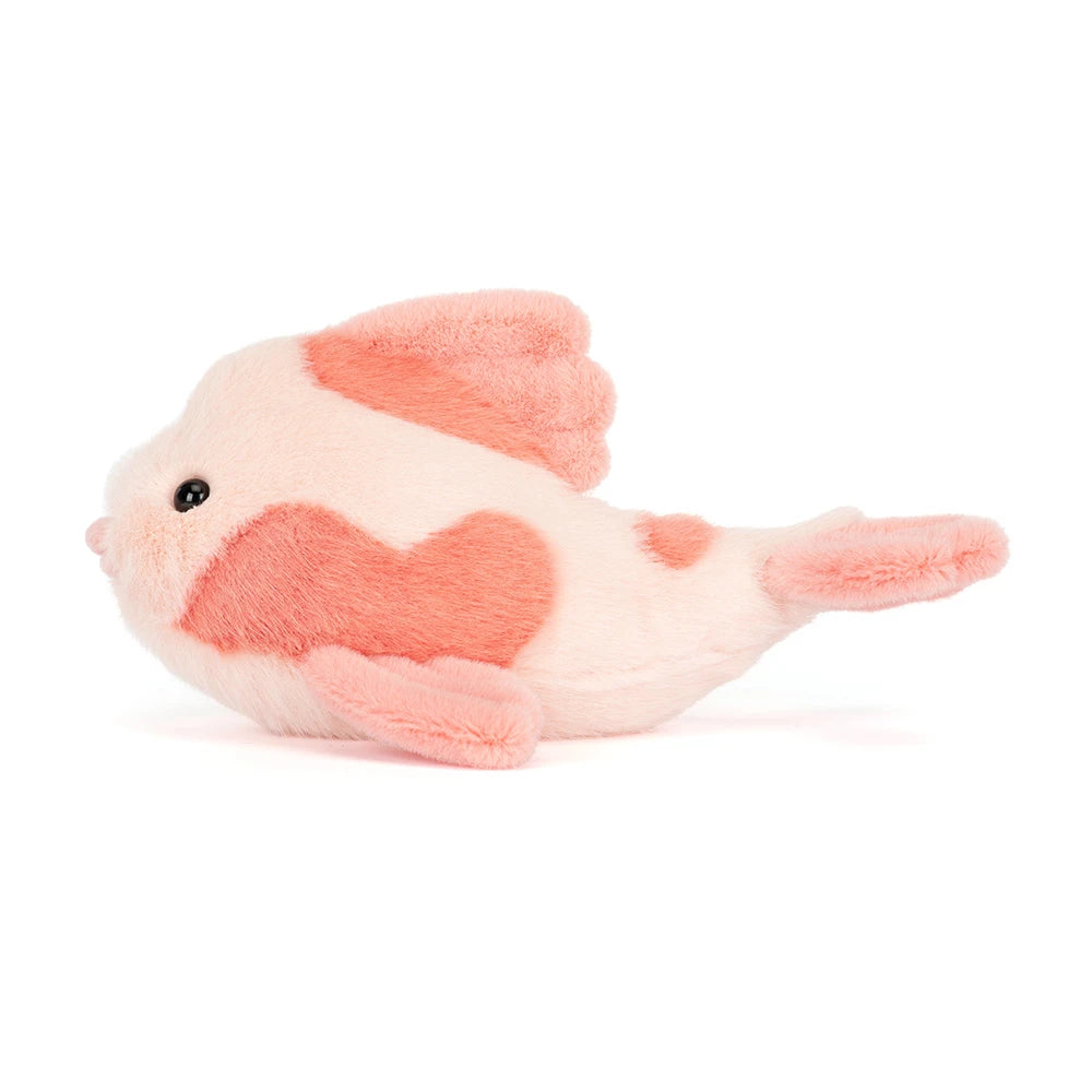 Plush toy fish with a heart pattern 