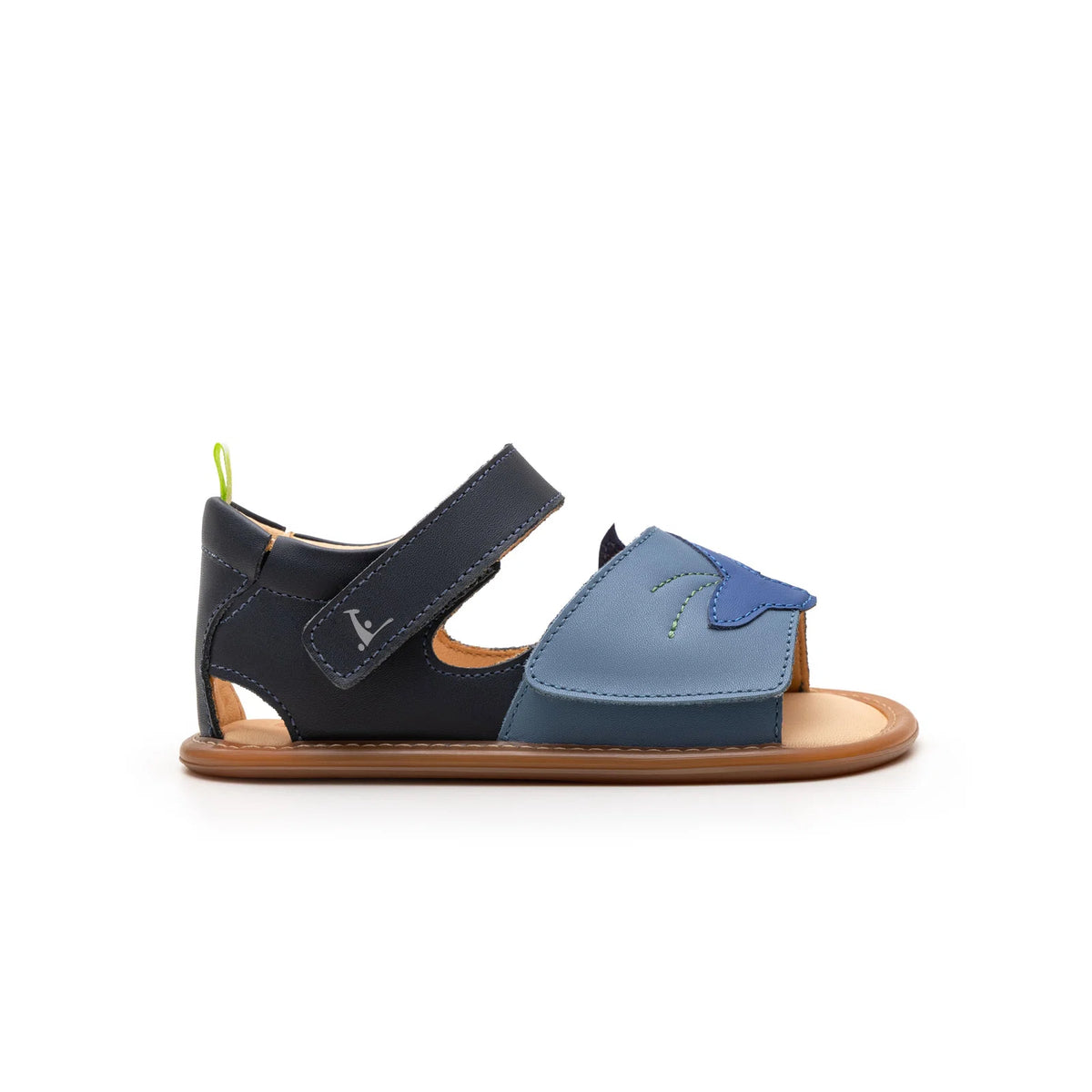 Angled view of a pair of Tip Toey Joey Flipper Sandals in Denim / Blue Tang / Navy