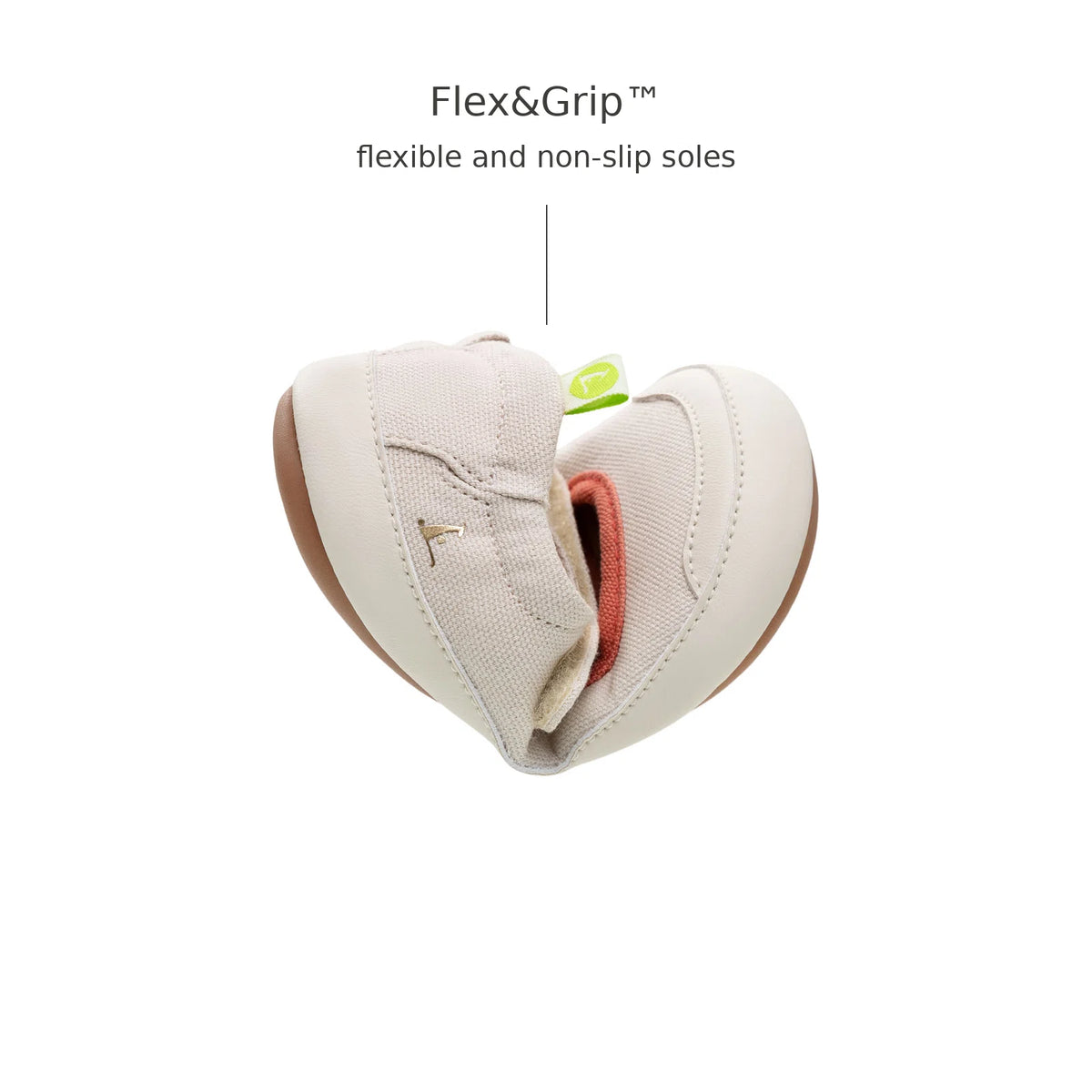 Tip Toey Joey Gaia Green Mary Janes in Lona Creme / Lona Salmao bending at the toe to show the flexible sole