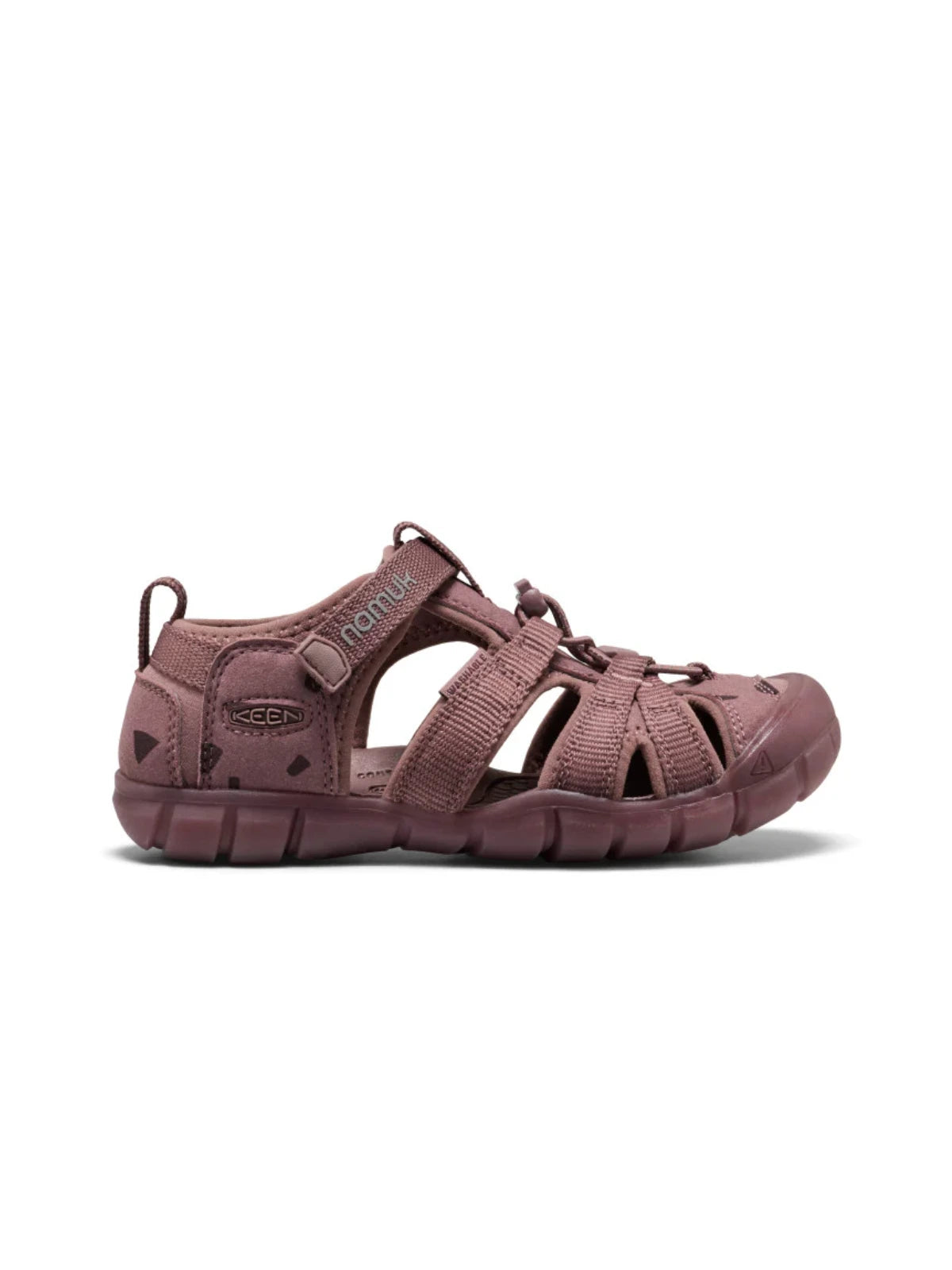 Side view of a mauve-colored KEEN brand waterproof sports sandal for children, featuring a durable rubber toe bumper, adjustable bungee laces, and a secure heel strap.