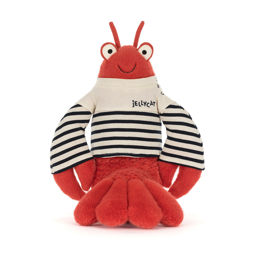 Plush toy lobster wearing a striped shirt  on a white background