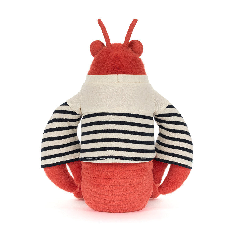 Plush toy lobster with red body, white and black striped shirt on a white background