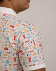 Side profile and sleeve detail of the Men's Childhood Games Polo by Elly.