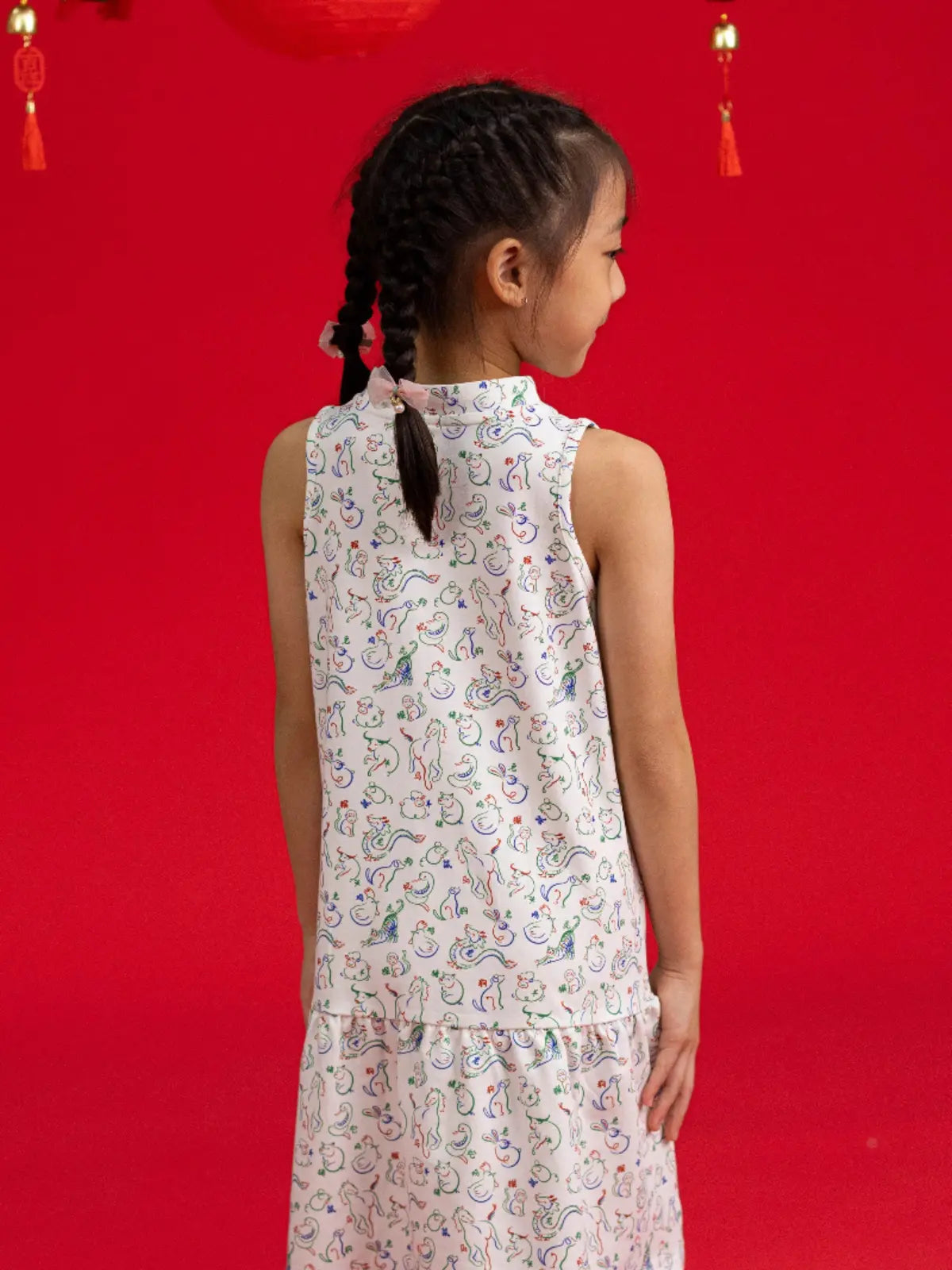 Back view of the Elly Naomi Cheongsam for girls in the Zodiac Mahjong collection.
